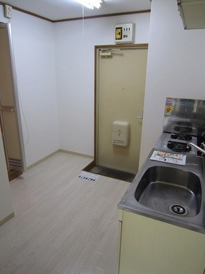 Other room space. Kitchen around