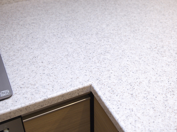 Kitchen.  [Artificial marble kitchen counter] The counter top in the kitchen, Also considered to daily care, Durable, Has adopted a hard luck dirt hardly scratches luxury acrylic artificial marble.