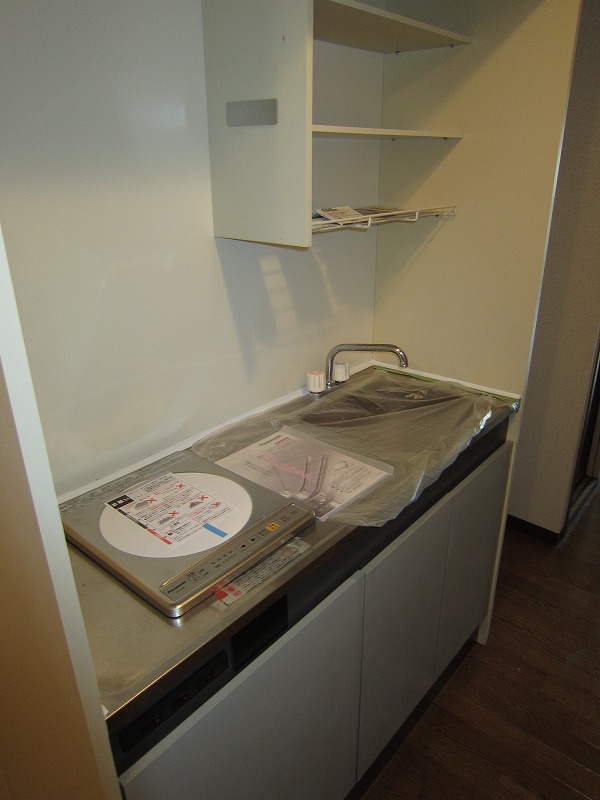 Kitchen. 208 is a photograph of the