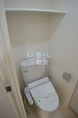 Living and room. Bidet with toilet