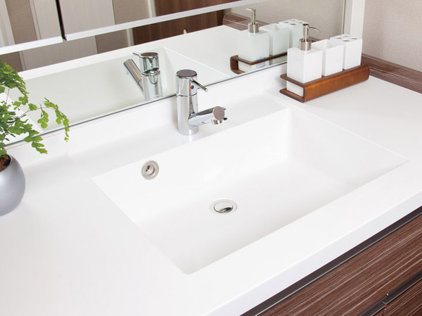 Bathing-wash room.  [Wash bowl integrated counter] Vanity artificial marble counter of, Because the seamless bowl-integrated, It is easy also beautifully clean appearance.