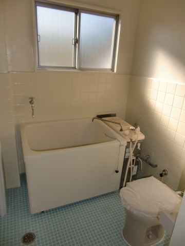 Bath. It is a bathroom with a window.