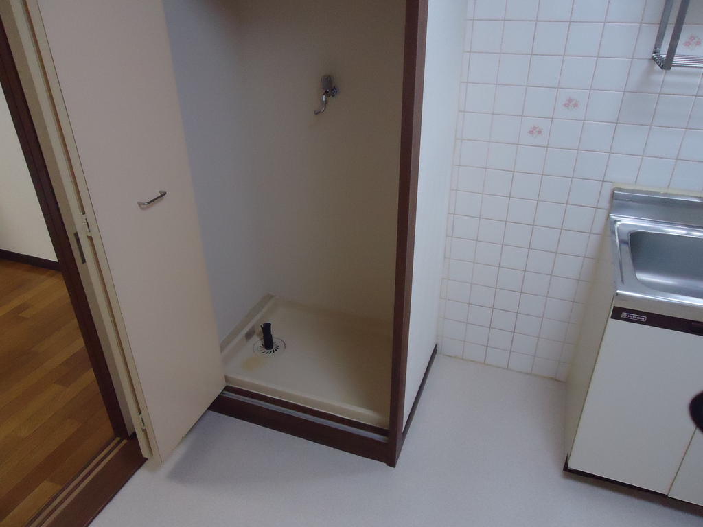 Other Equipment. Washing machine in the room