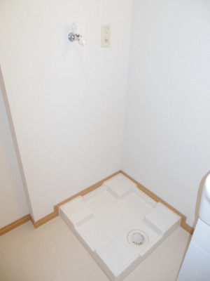 Other Equipment. Washing machine put in a room