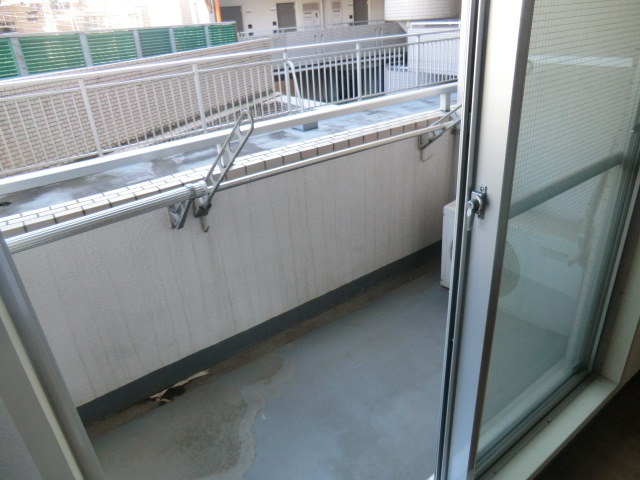 Balcony. Kitchen is a 2-neck