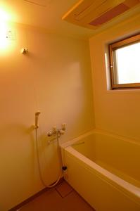 Bath. There is a window in the bathroom