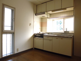 Kitchen. Dining is also bright with two faces window