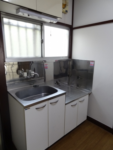 Kitchen. It is bright with window Kitchen.