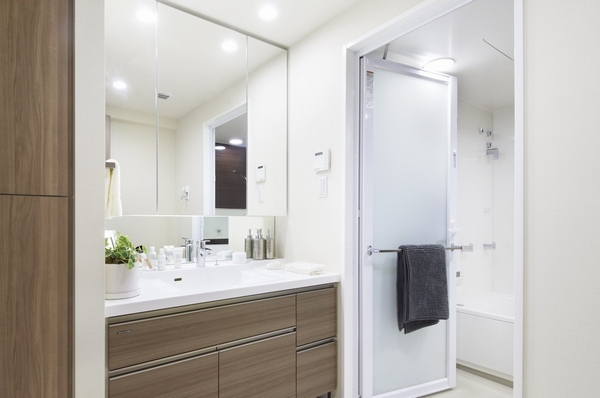 Square bowl-integrated counter with excellent design, Storage rich wash room with a linen cabinet