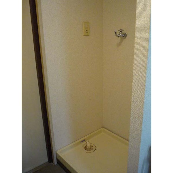 Other Equipment. Washing machine in the room