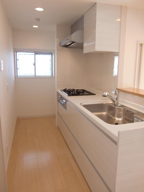 Kitchen. There is a window in the kitchen. With water purifier!