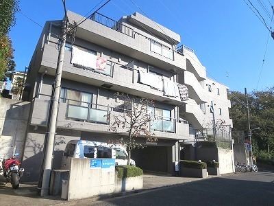 Building appearance. Towering on a hill
