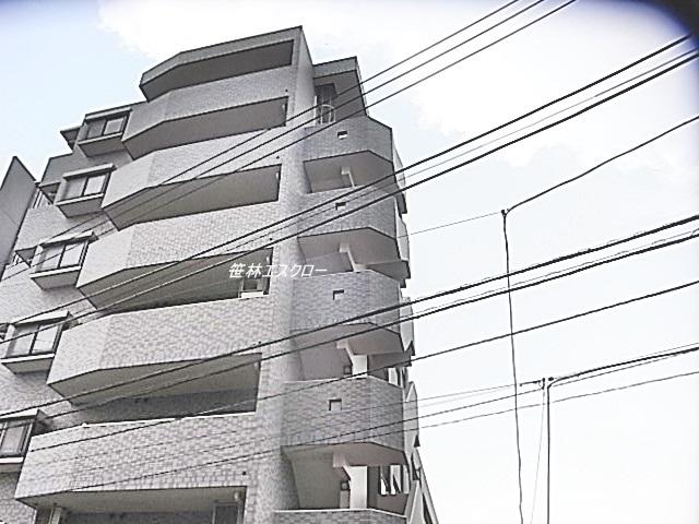 Local appearance photo. 1995 This is an automatic lock outer wall tiled apartment built