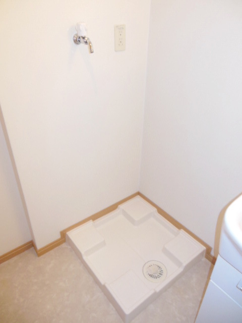 Other Equipment. Washing machine put in a room