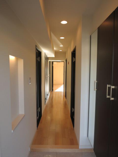 Entrance. Shoe box on the right hand side, We use a niche and well space on the left.