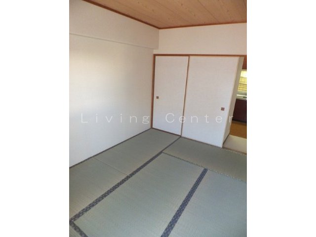 Living and room. Interior photo is a thing of another room. For your information.