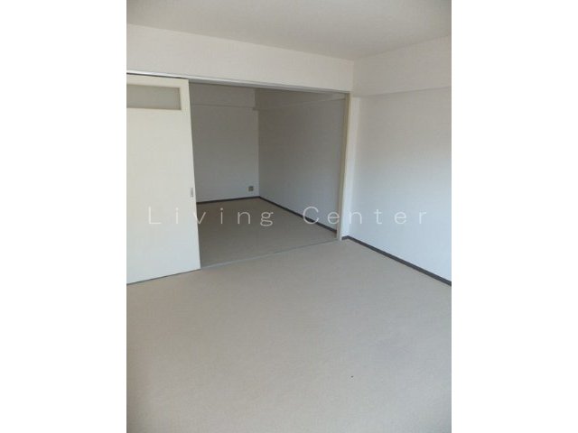 Living and room. Interior photo is a thing of another room. For your information.