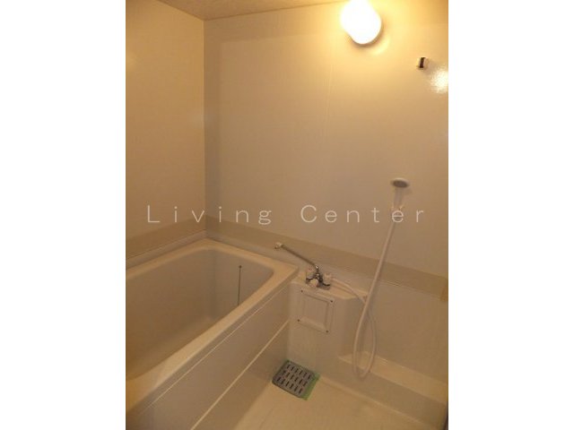 Bath. Interior photo is a thing of another room. For your information.