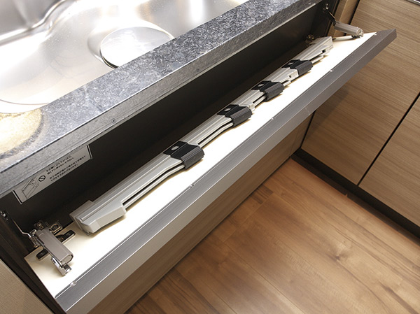 Kitchen.  [Kitchen knife flap storage] Secure a space that can accommodate the kitchen knife before sink. To absorb the shock of when opening a kitchen knife flap, It can be opened slowly. It is with lock function of the peace of mind.