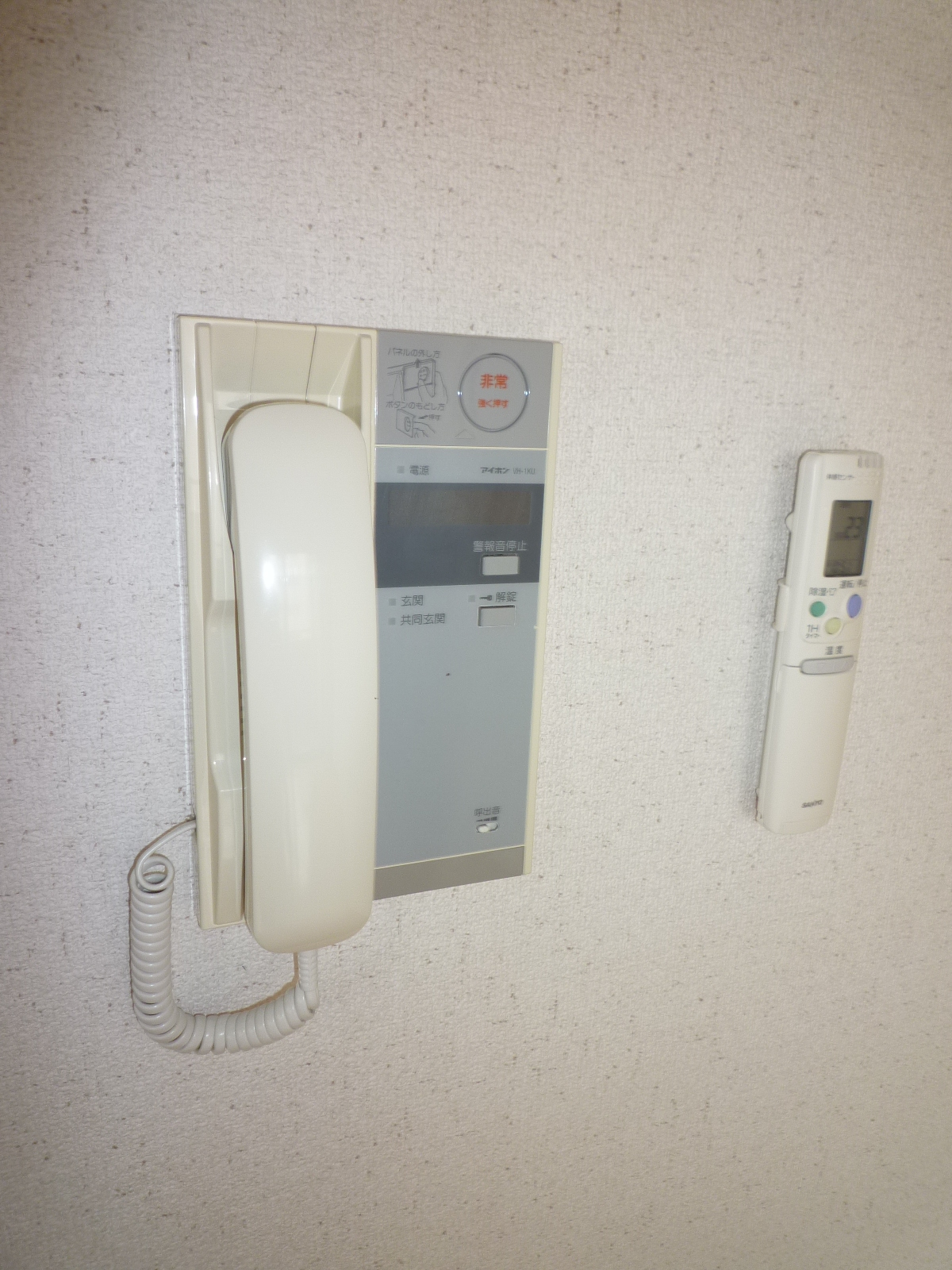 Security. Monitor with intercom. Woman is also safe. 