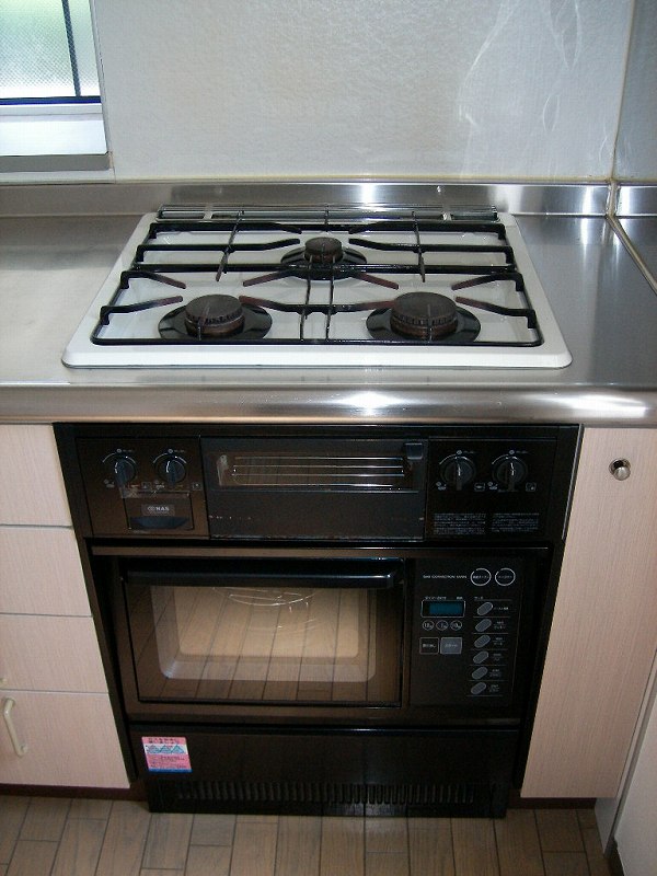 Kitchen. Three-necked stove (It is a photograph of a different room)