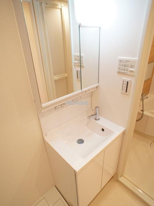 Wash basin, toilet. Bathroom vanity