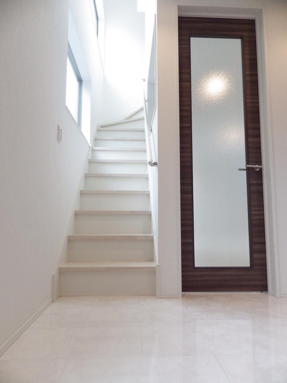 Entrance. Indoor (11 May 2013) Stairs go up from shooting bright entrance hall to the second floor