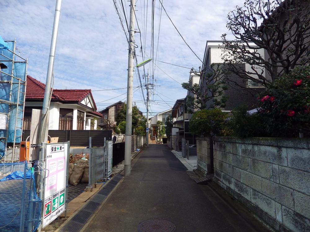 Local photos, including front road. It is a quiet place, surrounded by low-rise housing