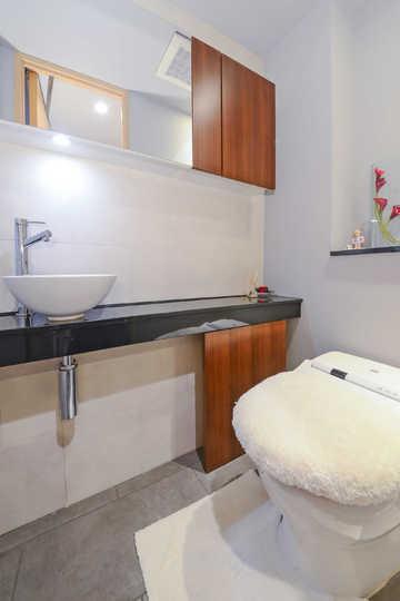 Toilet. It is Lavatories with a clean and spacious.