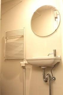 Wash basin, toilet. It has established a towel warmer