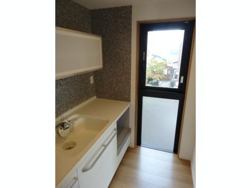 Kitchen. Even the window is in the kitchen space, It is bright space.