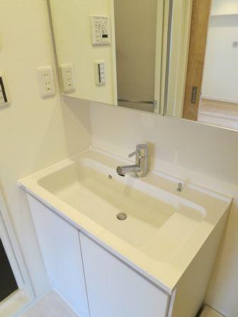 Wash basin, toilet. ~ New interior renovation completed ~