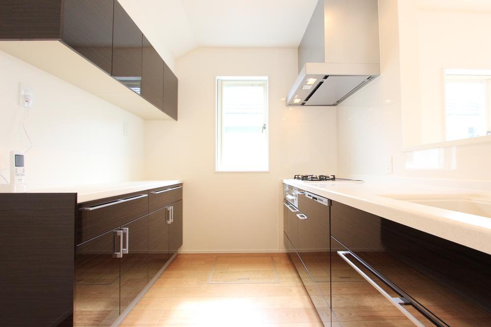 Kitchen. The kitchen is dishwasher, Water filter, With cupboards of large capacity with the same surface material on the back