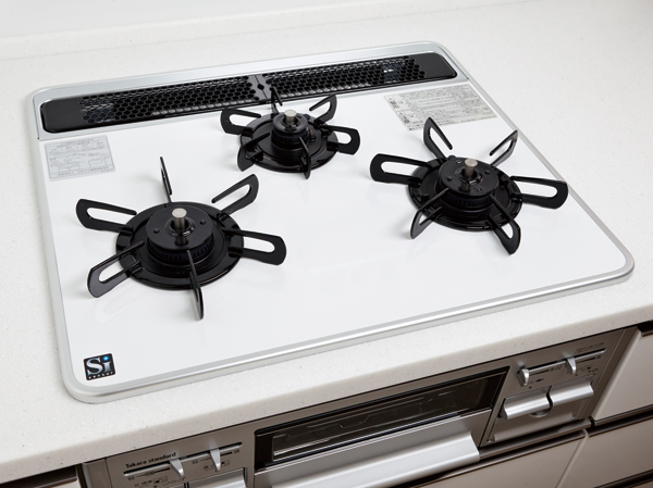 Kitchen.  [Three-necked glass coat stove] High-performance gas stove which has been subjected to function and ingenuity to simplify the care. Dirt is also easy to clean with wipe person, such as boiling over.