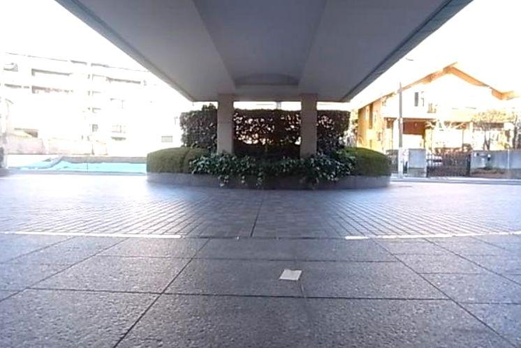 Entrance. Porte-cochere