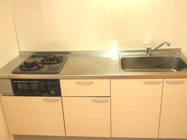 Kitchen. ■ Gas two-burner system Kitchen