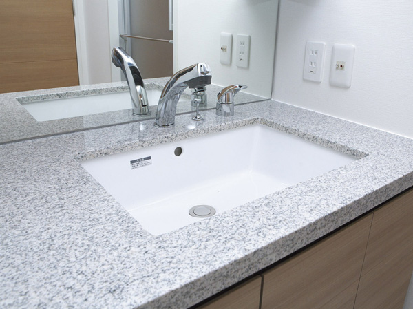 Bathing-wash room.  [Natural stone counter] Wash bowl and integrated counter made of natural stone. Beautifully full of luxury, The item that every day is to gracefully comfortable.