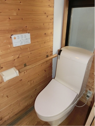 Toilet. With cleaning warm toilet seat