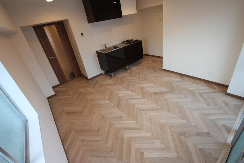 Living. Our original specification using natural solid wood flooring.