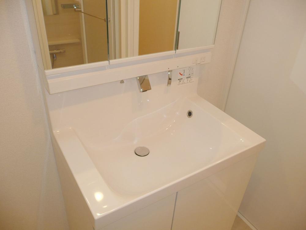 Wash basin, toilet. Bathroom vanity