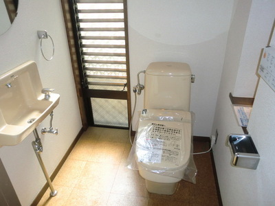 Toilet. Toilet is equipped with Washlet