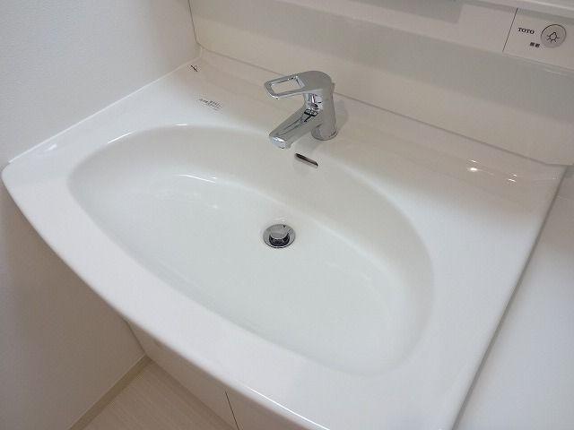 Wash basin, toilet. Bathroom vanity