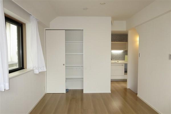 Living. There is convenient storage also in the living room