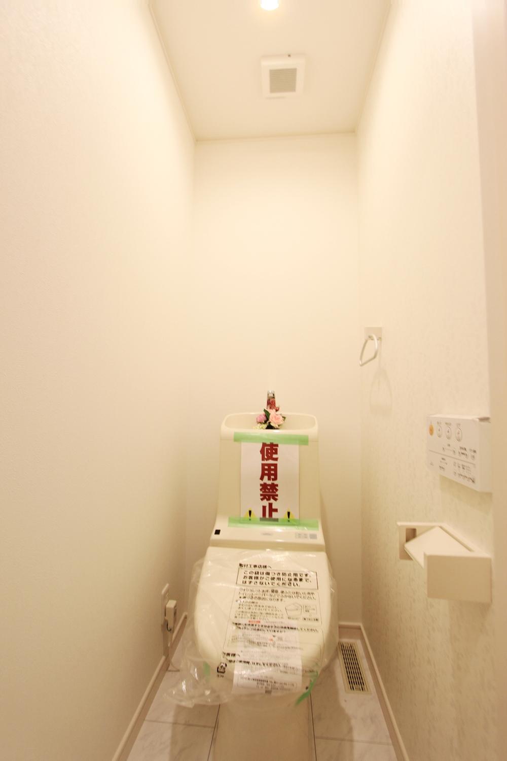 Toilet. It is a tank-less clean toilet.