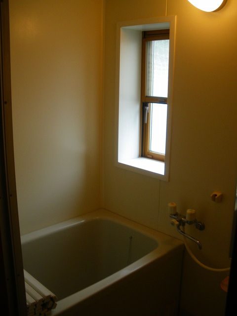 Bath. Window on the front