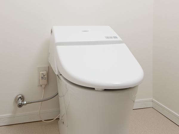 Interior.  [toilet] Low silhouette super water-saving toilet. Easy to clean with no edge shape, Always clean and maintained.