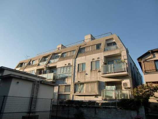 Local appearance photo. The building exterior is a picture. It is southeast facing angle dwelling unit. Sunshine is good. (2012, November 12,