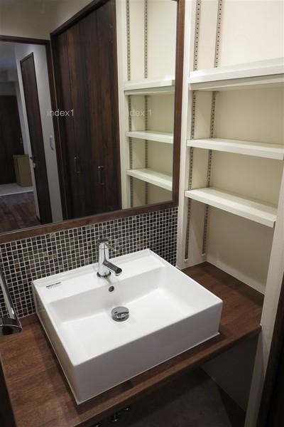 Wash basin, toilet. Storage space to be fulfilling washroom