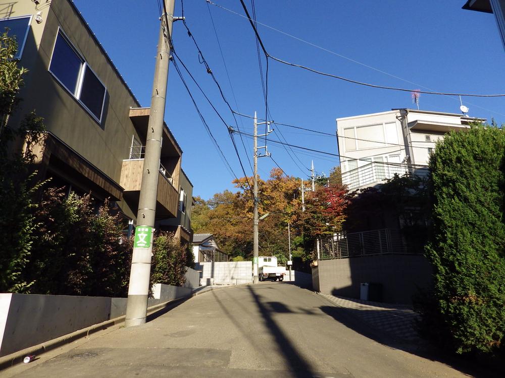 Spacious front road, As the car is also less leafy quiet residential area