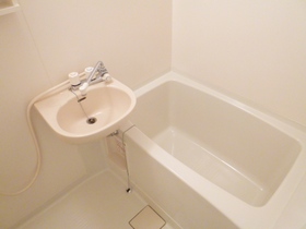 Bath. It is a bathroom with a bathroom dryer